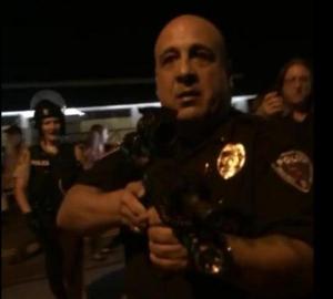 Ferguson Cop points gun at journalists on 8-20-14