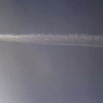 Clear Sunday Morning Midwest Sky Ripped with Chemtrail