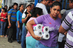 Venezuelan Woman Earns Her Living Standing in Line to Buy Toilet Paper